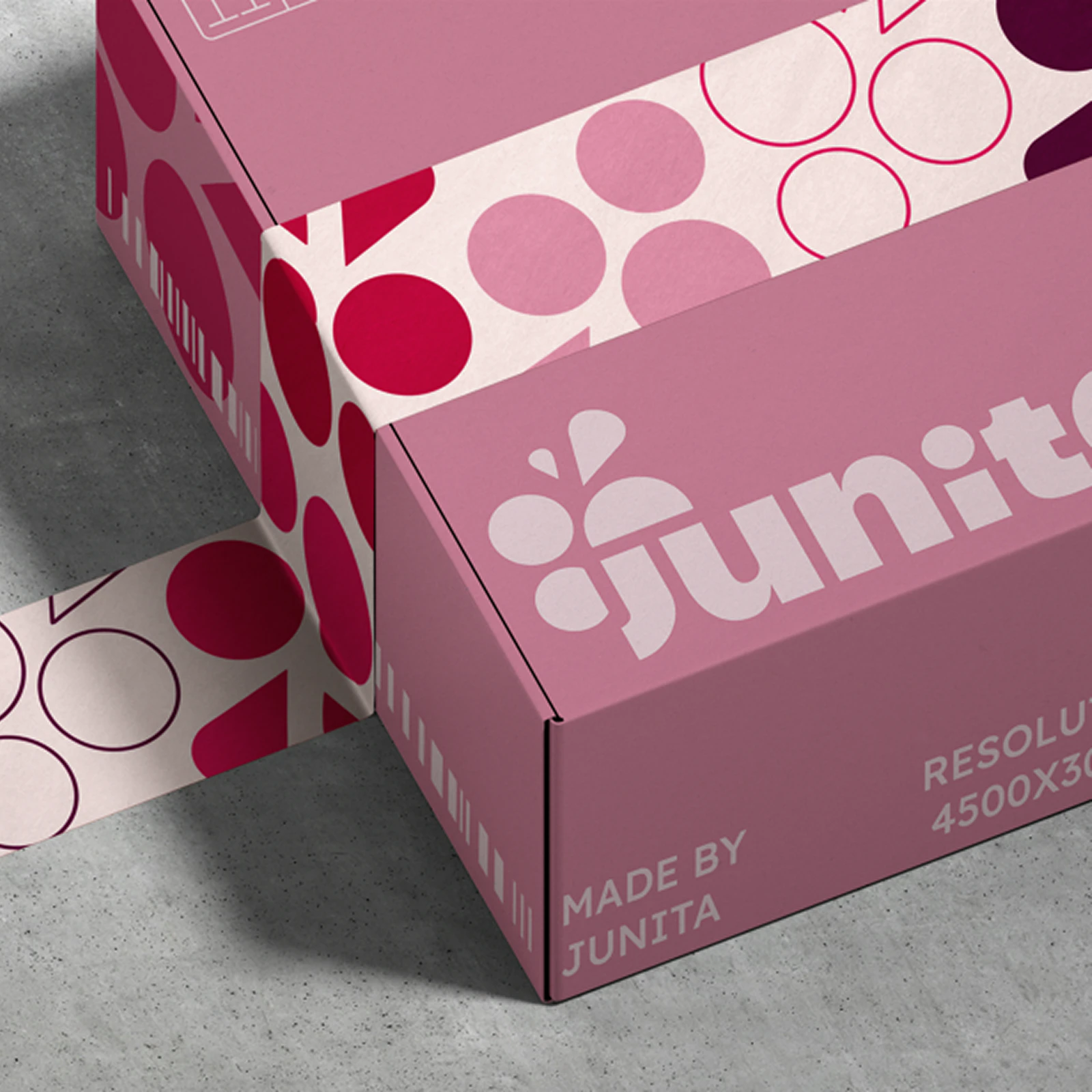 Junita : identité appliquée aux boîtes de packaging et à un ruban aux motifs de raisin