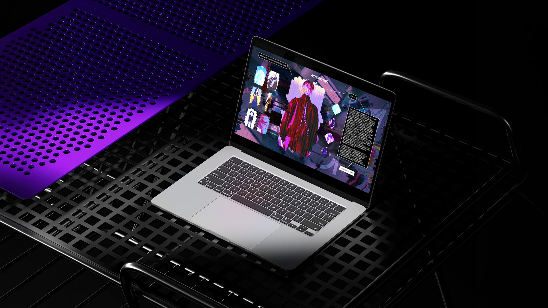 Lookbook ACRONYM : interface sur un MacBook au milieu de surfaces métalliques éclairées en violet