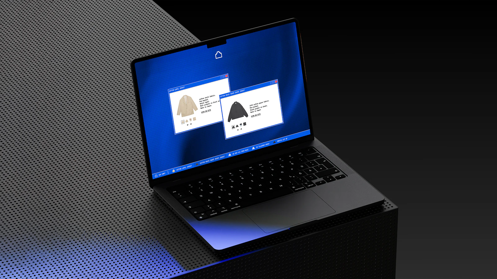 Lookbook CAV EMPT : interface sur un MacBook posé sur une plateforme métallique